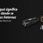 Nitecore: qué significa la marca, dónde se fabrican sus linternas y qué respalda el fabricante 5 Linternas Nitecore TIKI LE, HC75 UHE sobre fondo oscuro